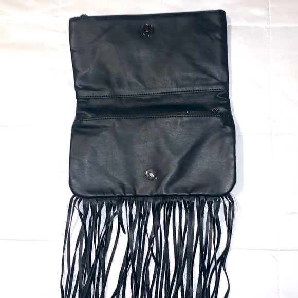 BCBGeneration black clutch bag. Snaps closed hanging leather strings. 2 zippers - Picture 7 of 9